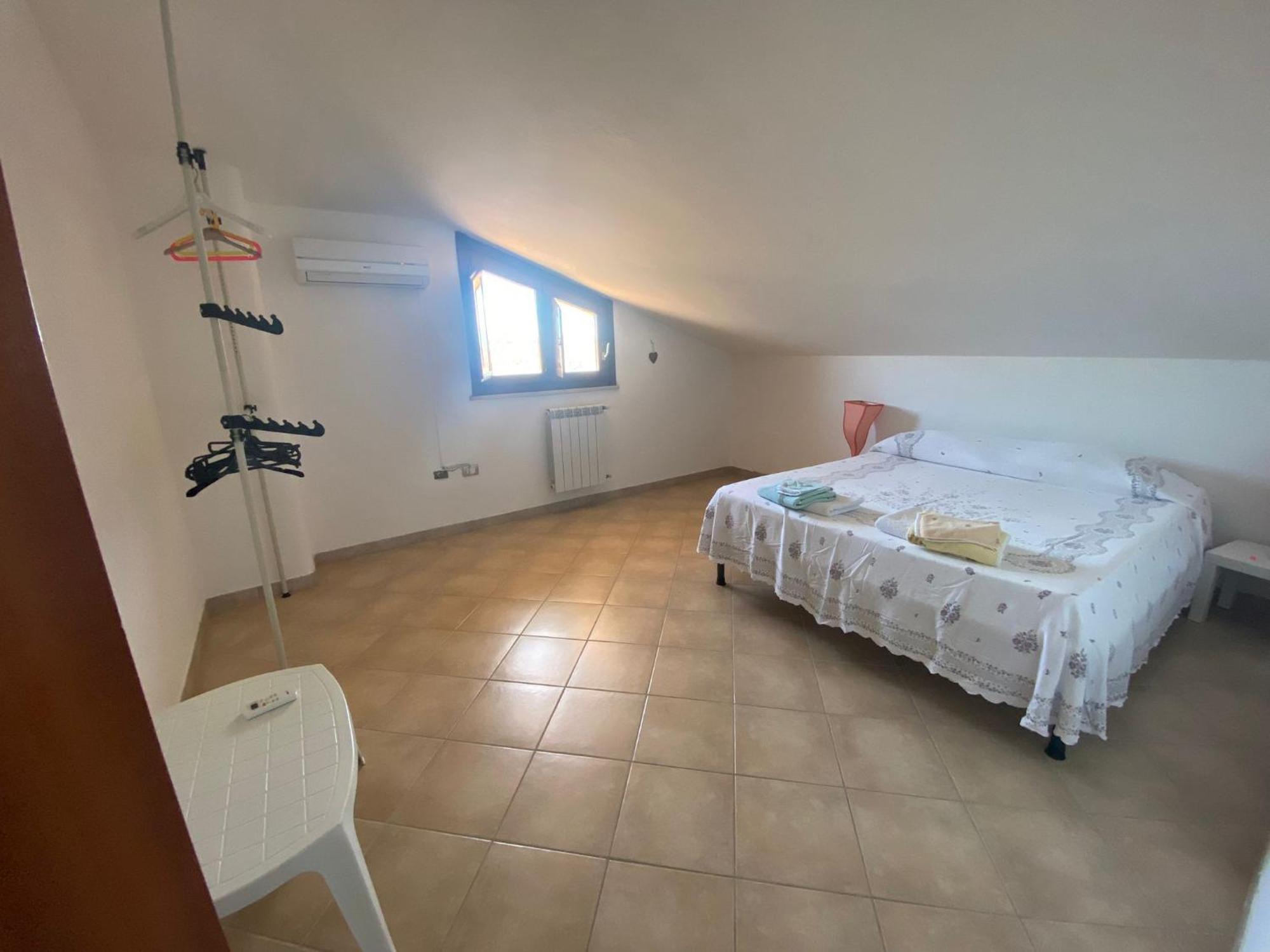 Casa Gina Apartment Порто Торес Екстериор снимка